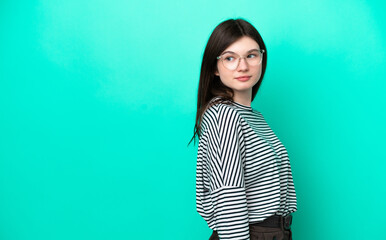 Wall Mural - Young Russian woman isolated on green background . Portrait