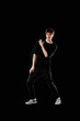 © Rychko Yevhen - young man in black t-shirt and jeans dancing