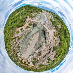 Wall Mural - Panoramic tiny planet of thermal springs in Canyon Langarica in Albania, Europe, Summer 2022