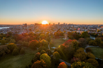 Wall Mural - Aerial Drone View of Patterson Park in Baltimore City in Fall at Sunset with the City Skyline in the Distance