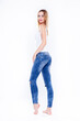 © bartekwardziak - Figure attractive blonde woman in blue jeans pants