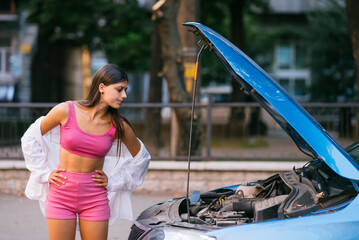 Sticker - Woman with broken car on the road. Look for help.