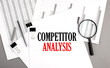© Iryna - COMPETITOR ANALYSIS text on a paper on chart background