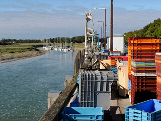 Wall Mural - Fishing port at Le Hourdel is a hamlet of Cayeux sur Mer, a resort town in the Somme department in Hauts-de-France in northern France. The town is part of the Baie de Somme 