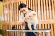 © tonefotografia - Female professional groomer trimming haircut dog at pet spa grooming salon