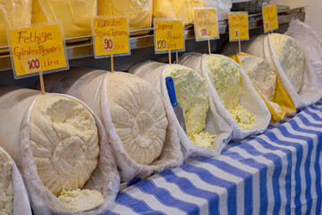 Wall Mural - Types of village cheeses sold in the public market in Turkey. Tulum cheeses in TURKEY