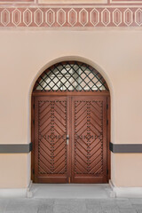 Wall Mural - Entrance of building with brown wooden door