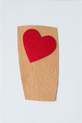 Wall Mural - felt heart on rough and corrugated paper