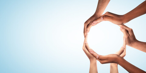 Symbol and shape of circle created from hands.The concept of unity, cooperation, partnership, teamwork and charity. diversity of a diverse group of people connected together as a supportive symbol.