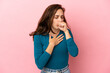 Young caucasian woman isolated on pink background coughing a lot