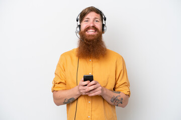 Telemarketer man isolated on white background sending a message with the mobile