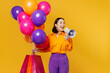 Young woman wear casual clothes celebrating hold balloons shopping package bags scream in megaphone isolated on plain yellow background. Black Friday sale buy day birthday 8 14 holiday party concept.