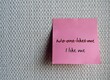 © ariya j - Pink note stick on white wallpaper, written NO ONE LIKES ME  (with red cross out) , I LIKE ME - concept of positive encouraging motivating self - talk , replacing negative thought with positive one