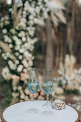 Wall Mural - glasses of champagne on table