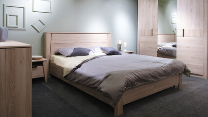 Poster - Stylish interior of contemporary room with comfortable bed