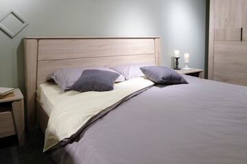 Poster - Stylish interior of contemporary room with comfortable bed