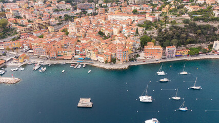 Wall Mural - Villefranche, small town in france, French Riviera, Drone view on coast and town