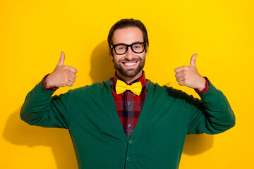 Sticker - Photo portrait of young attractive male specs showing double thumb up good job wear trendy green outfit isolated on yellow color background