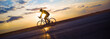 © Solid photos - Young sports man cycling with bicycle on the road in summer