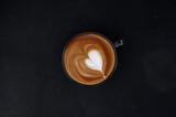 Fototapeta Mapy - hot coffee latte art heart shape 