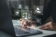 © Kannapat - Legal business concept. Labor law, Lawyer, Online legal advice, Hand of human with legal services icon on laptop screen.
