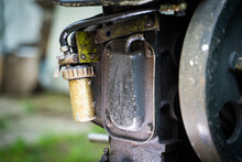 Chinese Fuel Filter On A Walk-behind Tractor Close-up On A Blurred Background