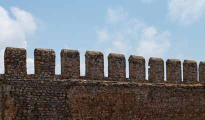 Wall Mural - Fragment of the fortress wall of a medieval castle