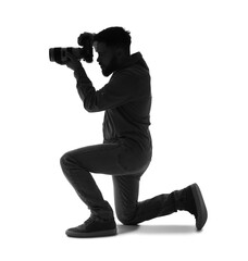 Wall Mural - Silhouette of male photographer with camera on white background