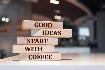 Poster - Wooden blocks with words 'Good ideas start with coffee'.