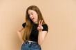 © Asier - Young redhead woman cut out isolated showing number two with fingers.