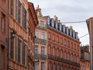 Wall Mural - View of colorful ancient brick buildings in the historic center of the 