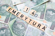 inscription 14 Emerytura which means 14 pension next to polish money. Concept showing program of social policy in Poland