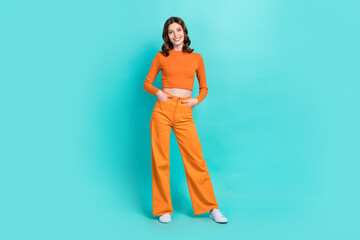 Wall Mural - Full length photo of optimistic lady dressed bright outfit good mood isolated on cyan color background
