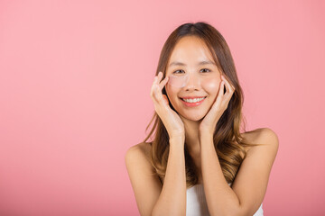 femininity. asian beautiful young woman smiling mask cosmetic patches gel under the eyes, portrait f