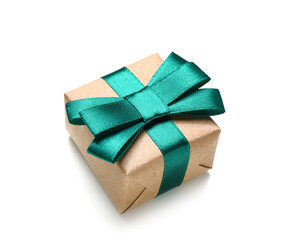 Gift box tied with beautiful green ribbon on white background