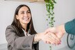 © Westend61 - Happy recruiter shaking hand with candidate in office
