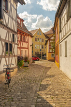Germany, Bavaria, Forchheim, Half-timbered Houses Along Cobblestone Alley In Rosengasschen Yawn