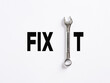 © Cagkan - The word fix it written with a wrench. To repair or fix something broken, maintenance service business