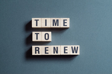 Time to renew - word concept on cubes