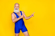 © deagreez - Photo of cheerful sporty man coach wear costume two arm direct empty space opening news gym offer sale isolated on yellow color background