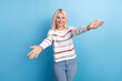 Photo of cheerful stunning lady wear trendy clothes open arms say come here join party isolated on blue color background