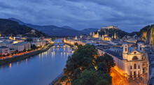 Scenic Overview Of The Salzach River And The Historical City Of Salzburg At Nightfall; Salzburg, Salzburg, Austria