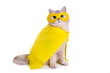 Funny white cat in a yellow mask and cape, sitting on a white background