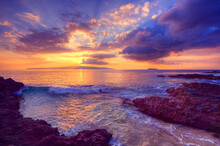Beautiful Sunset At Maui Wai Or Secret Beach; Makena, Maui, Hawaii, United States Of America