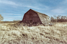 Dilapidated Barn In The Countryside Of The Canadian Prairies; Manitoba, Canada