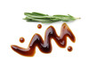 Balsamic glaze and rosemary on white background, top view