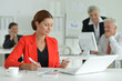 © aletia2011 - group of successful business people in office, businesswoman on foreground