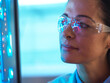 © Connect Images - Scientist in glasses looking at screen