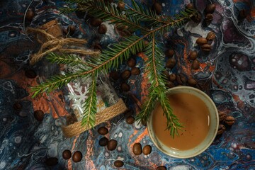 Wall Mural - Cup of coffee, beans and cookies on a dark background. Abstract backdrop fluid art