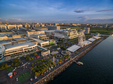 Mall Of Asia In Bay City, Pasay, Manila Philippines With Pier And Cityscape.
